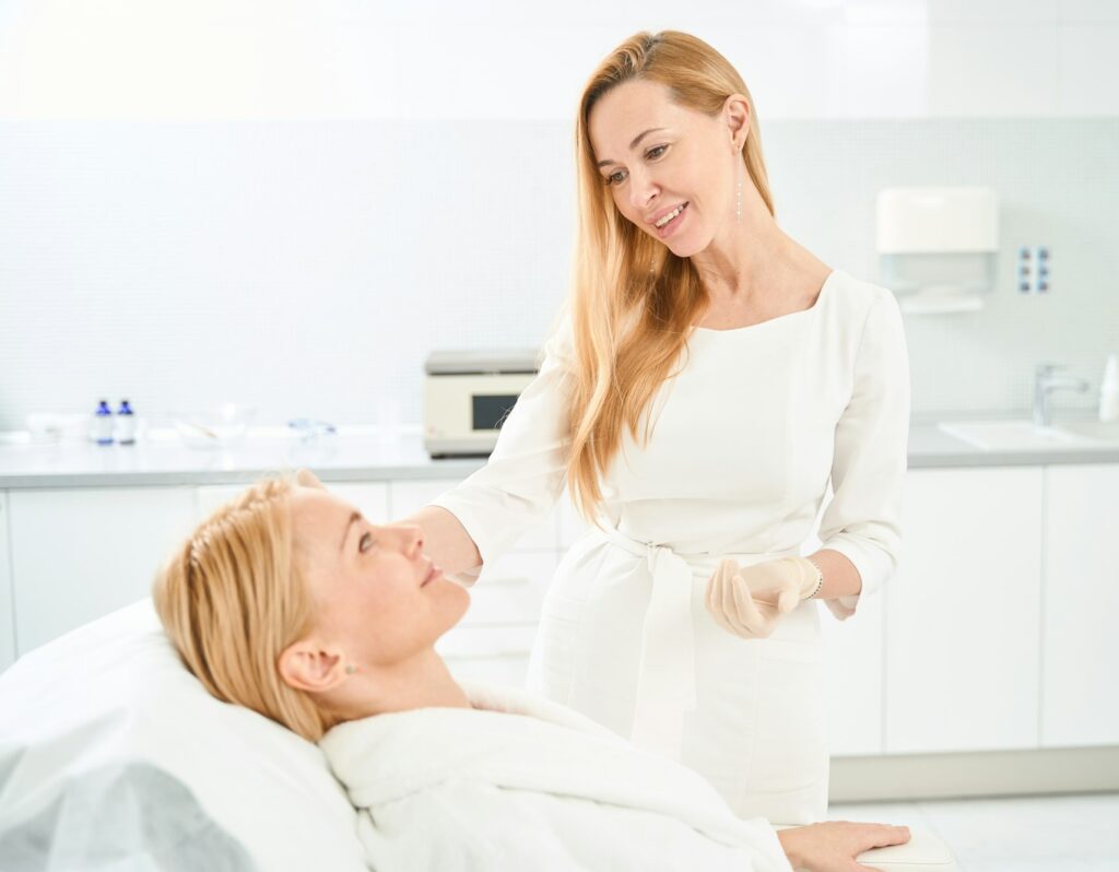 Leading expert of aesthetic medicine keeping primary consultation to woman