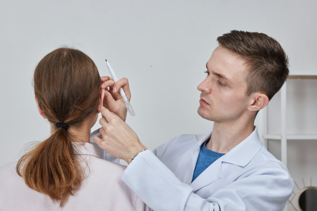 Otoplasty markup for surgical reshaping of the pinna, or outer ear for correcting an irregularity