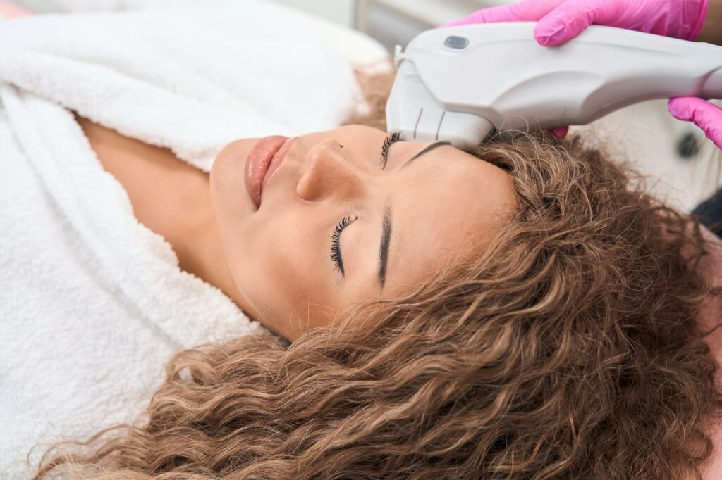 Young patient in the clinic of aesthetic cosmetology
